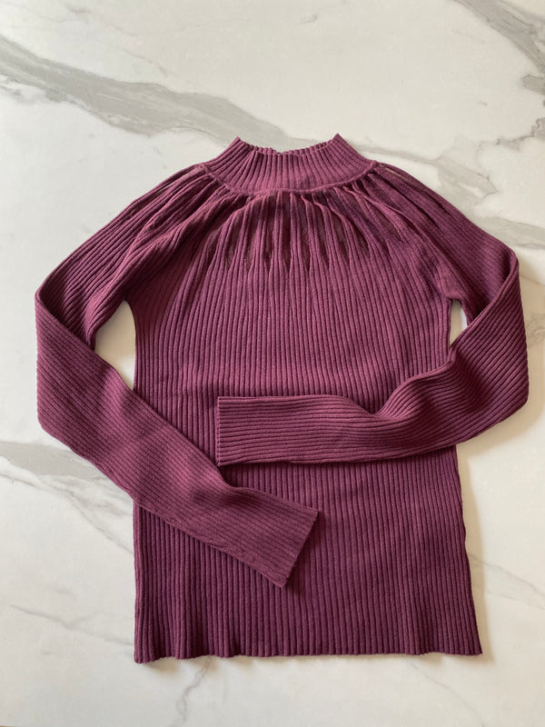 AKÉ-Pull con inserti
