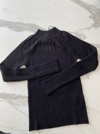 AKÉ-Pull con inserti