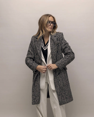AKÉ-cappotto