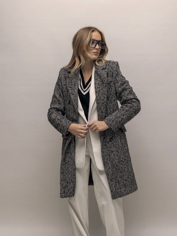 AKÉ-cappotto